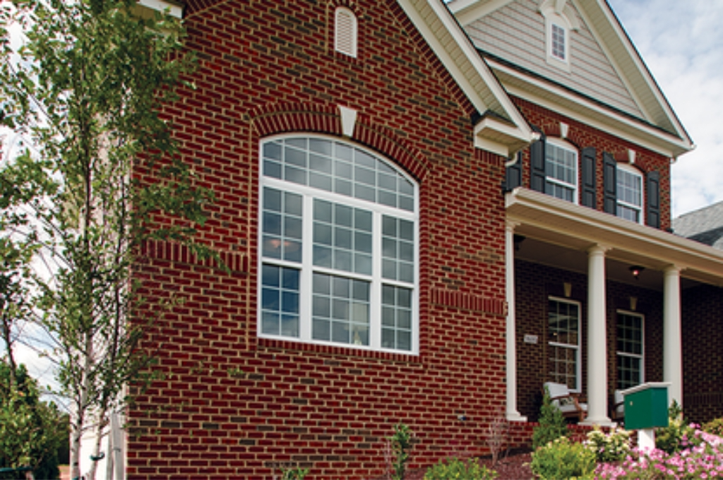 A family style home in a community like Belgium with a focus on the clean clear windows