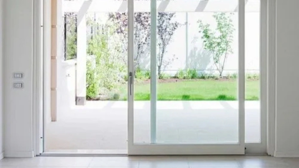 A perfectly repaired sliding glass door in Brussels gliding smoothly afte service from Windows Repair Belgium